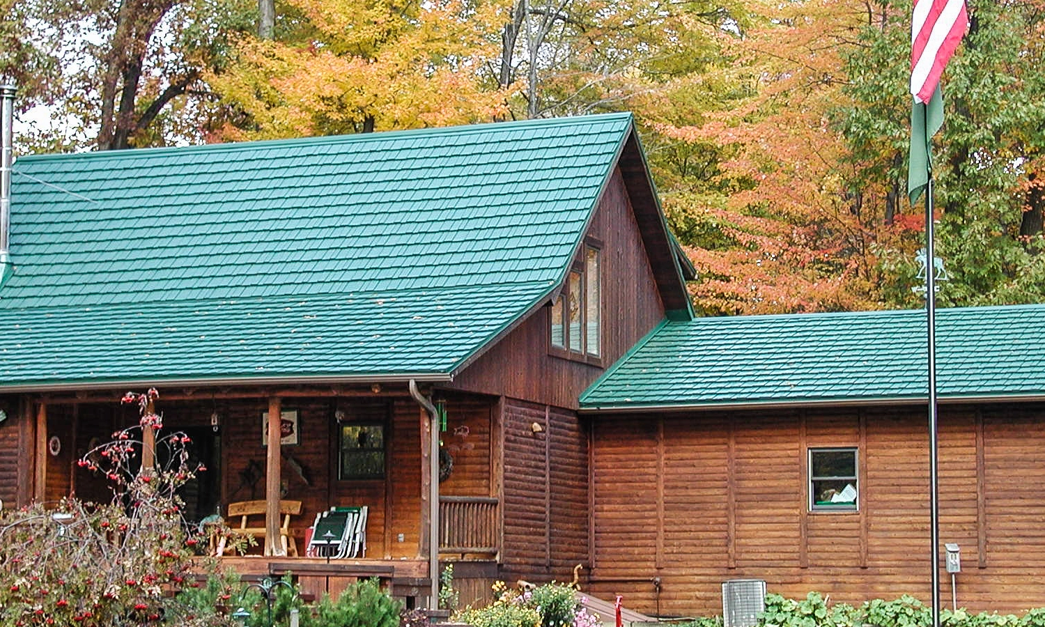 Cabin With a Green Asphalt Roof